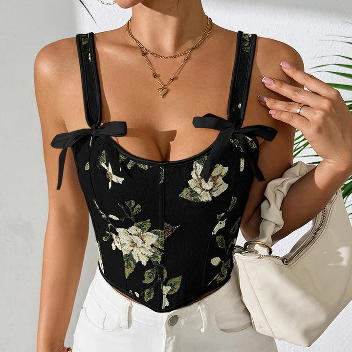 Débardeur femme fleuri vintage, coupe cintrée, bretelles à nouer. Un haut mode et élégant pour vos soirées.