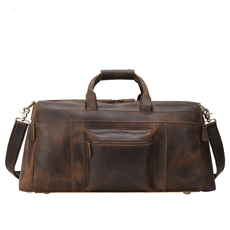 Sac de voyage homme vintage en cuir marron, cabas pratique et grand format pour vos essentiels.