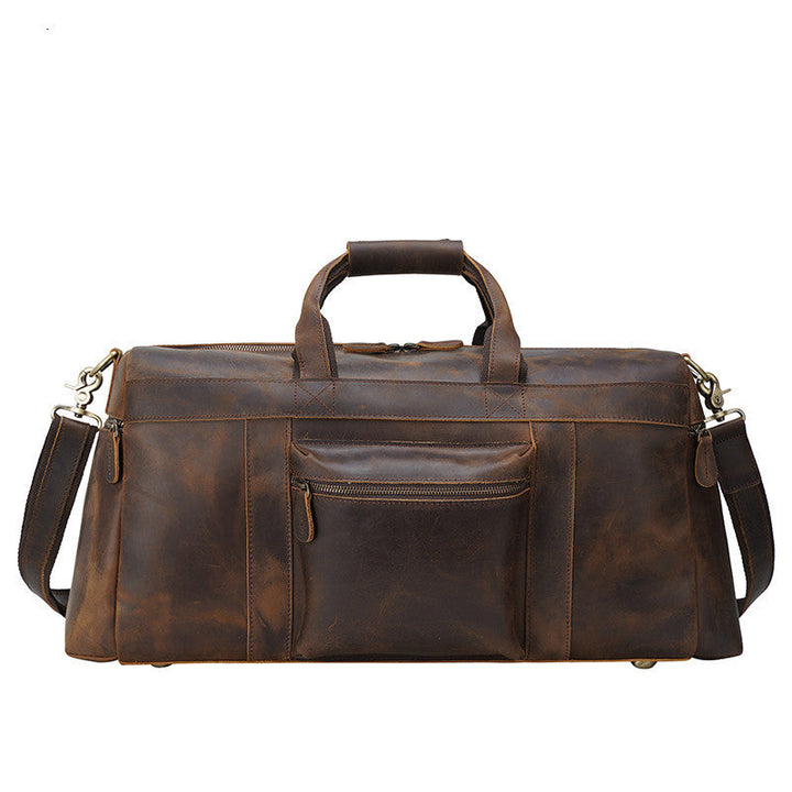 Sac de voyage homme vintage en cuir marron, cabas pratique et grand format pour vos essentiels.