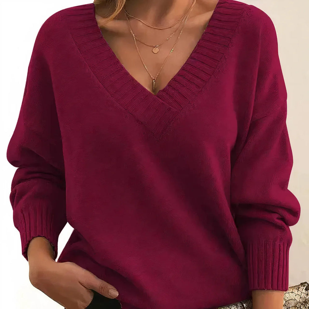 Pull femme décontracté et confortable en tricot doux, parfait pour un style quotidien polyvalent.
