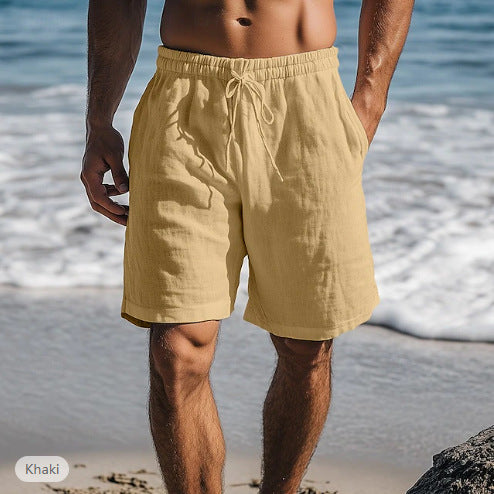 Short homme noir à taille élastique, coupe droite moderne, idéal pour la plage ou un look estival décontracté.