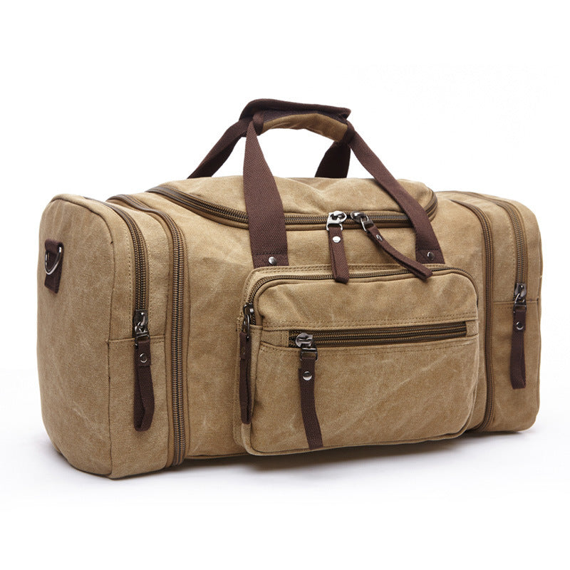 Vue d'ensemble du sac de voyage homme en toile, soulignant sa grande capacité et son aspect pratique.