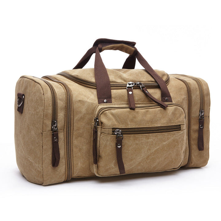 Vue d'ensemble du sac de voyage homme en toile, soulignant sa grande capacité et son aspect pratique.