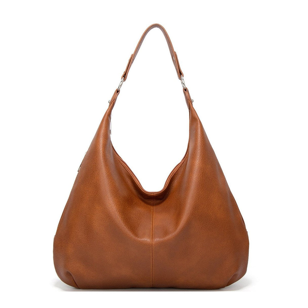 Sac cabas femme robuste et léger pour un usage quotidien. Porté épaule, élégant et pratique.