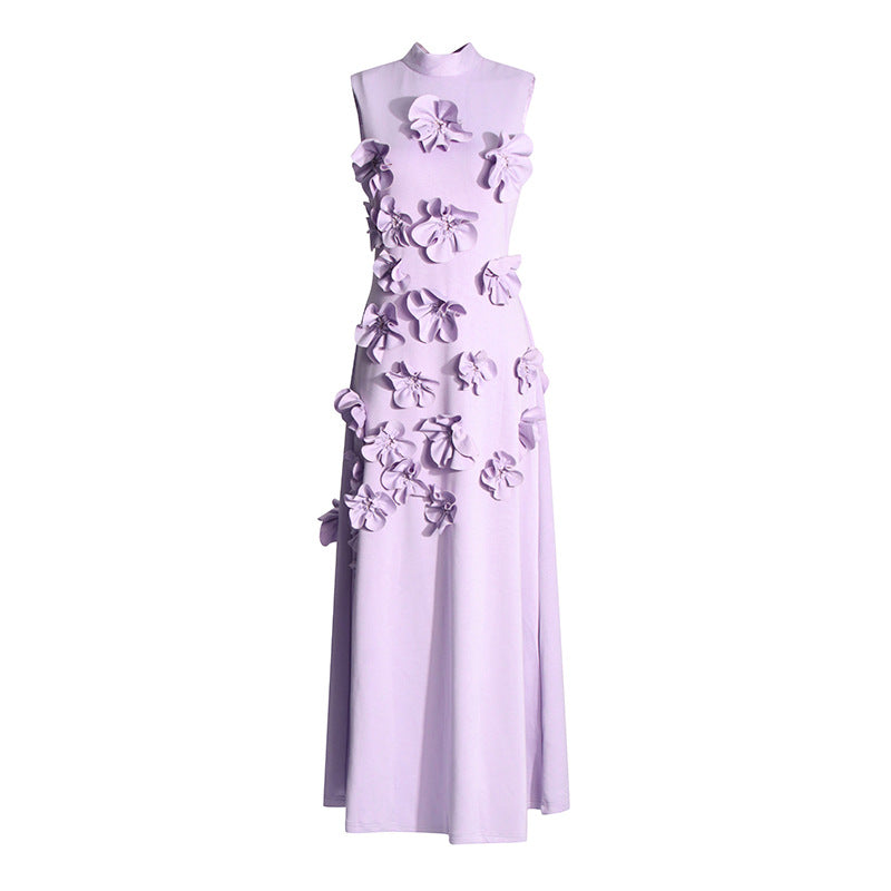 Robe maxi longue sans manches, très féminine et élégante, parfaite pour une occasion spéciale estivale.