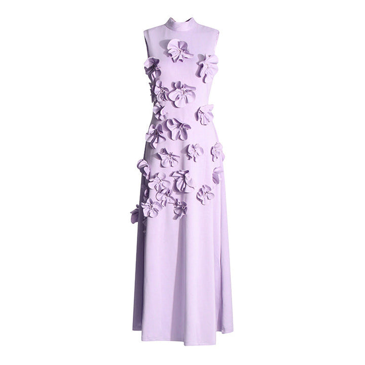 Robe maxi longue sans manches, très féminine et élégante, parfaite pour une occasion spéciale estivale.