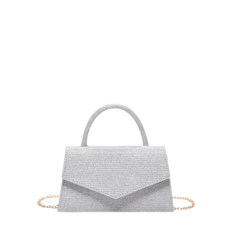 Accessoire chic, sac à main femme petit carré effet diamant. Pochette polyvalente pour toute occasion élégante.