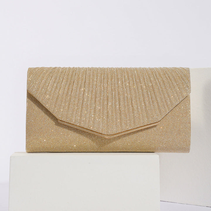 Sac de soirée pochette vintage femme, forme coussin, très chic, avec rabat élégant pour toutes occasions.