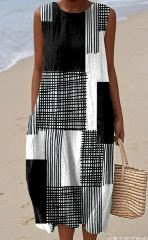 Robe midi femme sans manches imprimée, coupe décontractée élégante pour été/printemps. Fluide et confortable.