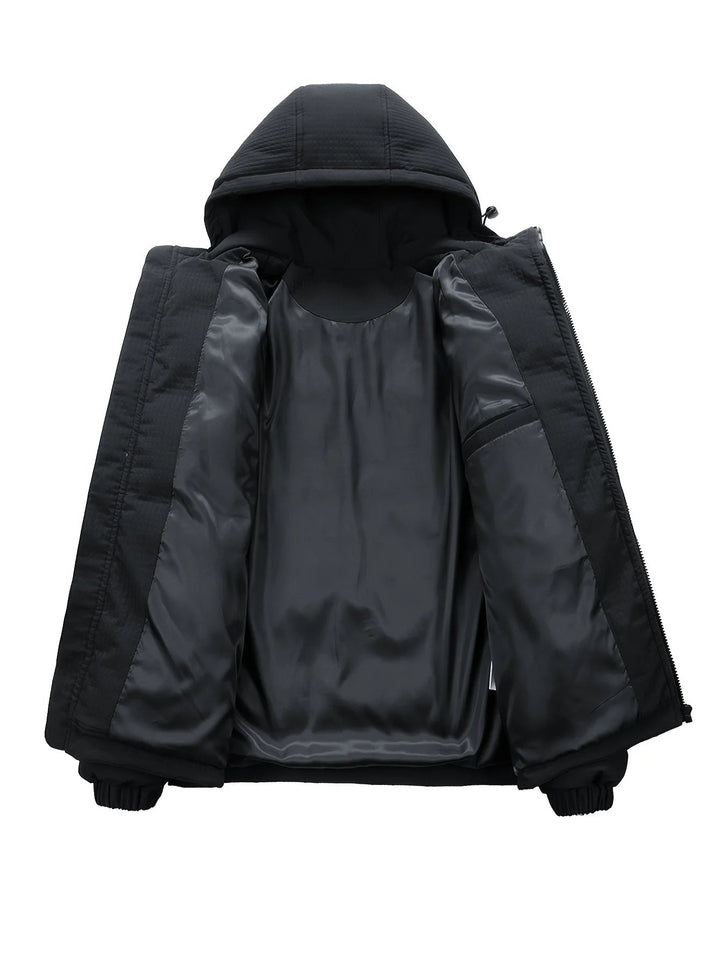 Manteau urbain homme chaud matelassé noir avec capuche, parfait contre le froid hivernal.