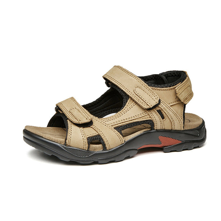 Sandales romaines homme avec design à brides entrecroisées, un choix confortable et élégant pour l'été.