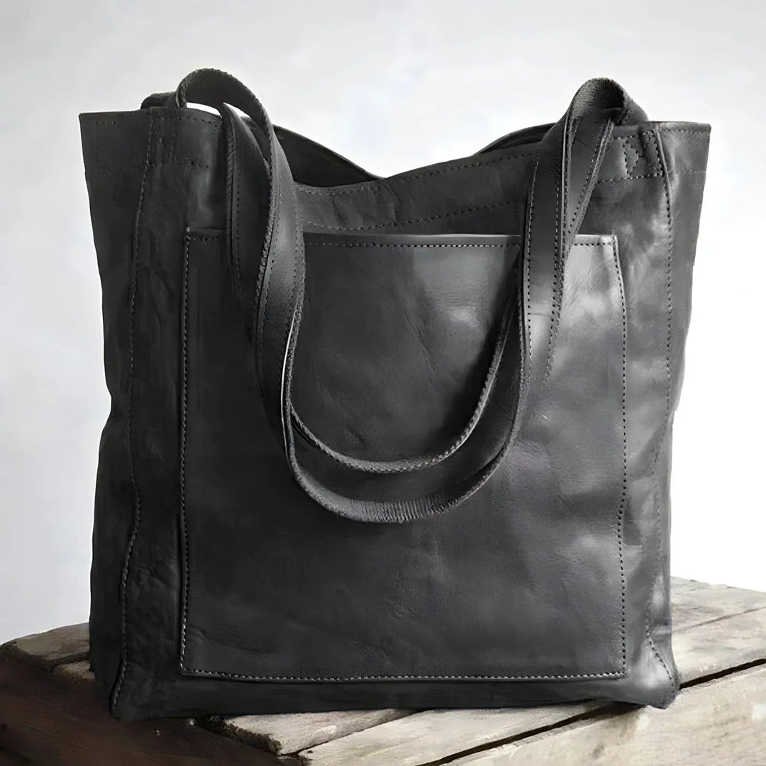 Sac shopper marron en cuir véritable, élégant et spacieux, parfait pour les besoins quotidiens de la femme moderne.