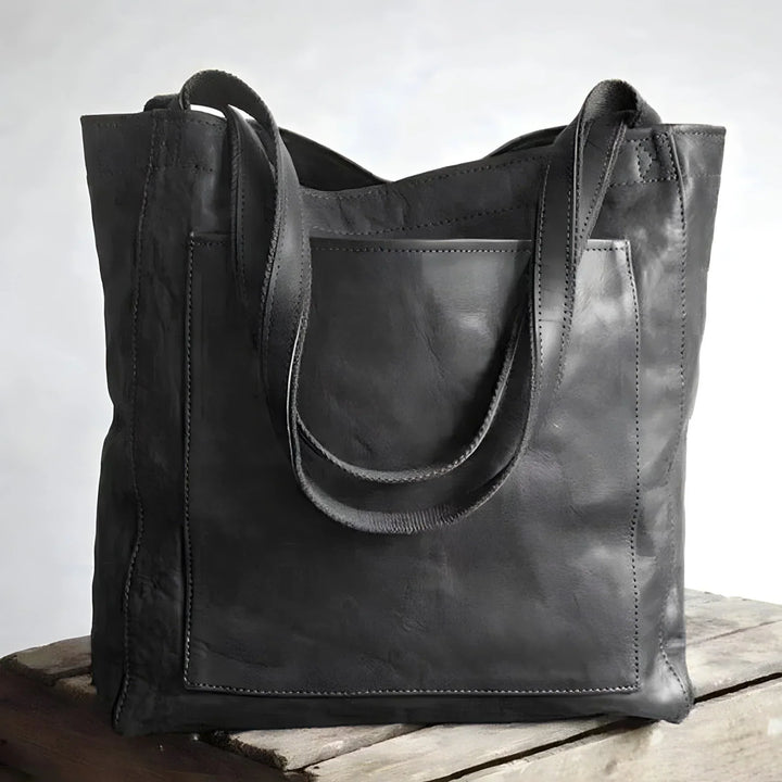 Sac shopper marron en cuir véritable, élégant et spacieux, parfait pour les besoins quotidiens de la femme moderne.