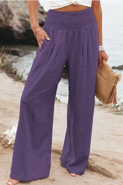 Pantalon taille haute femme en lin, jambes droites, coupe décontractée confortable et chic.