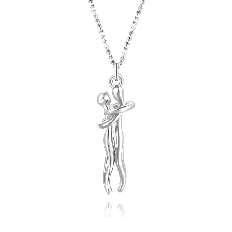 Collier pendentif étreinte pour couple, symbole d'amour et de connexion éternelle.