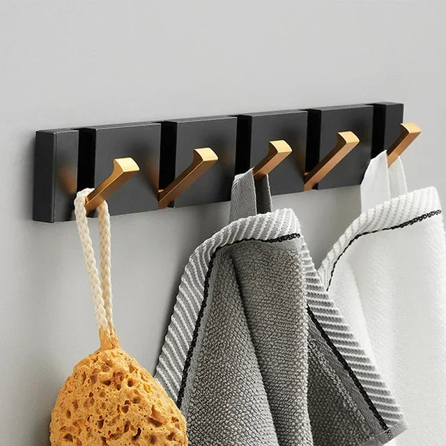 Organisateur mural pliable en acier inoxydable. 5 crochets pour entrée, salle de bain. Rangement discret et moderne.