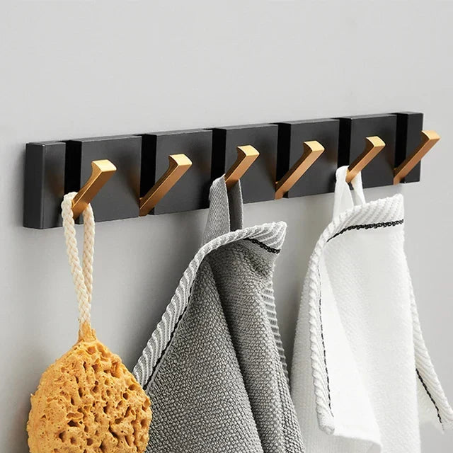 Crochet mural en inox, 5 patères pliables. Optimise le rangement de votre entrée, cuisine ou salle de bain. Style moderne.