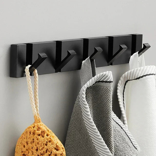Organisateur mural moderne, 5 crochets pliables. En inox, idéal pour un rangement élégant dans l'entrée ou la salle de bain.