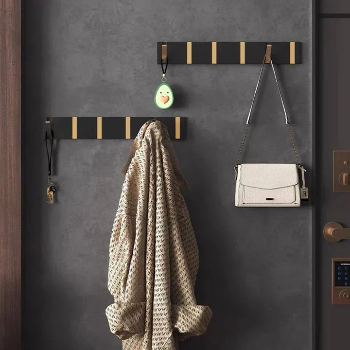 Rangement mural moderne, crochet pliable RVS pour serviettes ou vêtements. Idéal pour petite entrée, salle de bain.