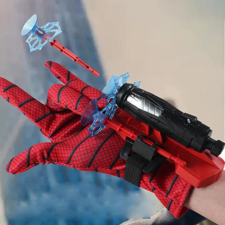 Kit jouet super-héros : lanceur de toiles avec fléchettes et gants, parfait pour le jeu d'action enfant.