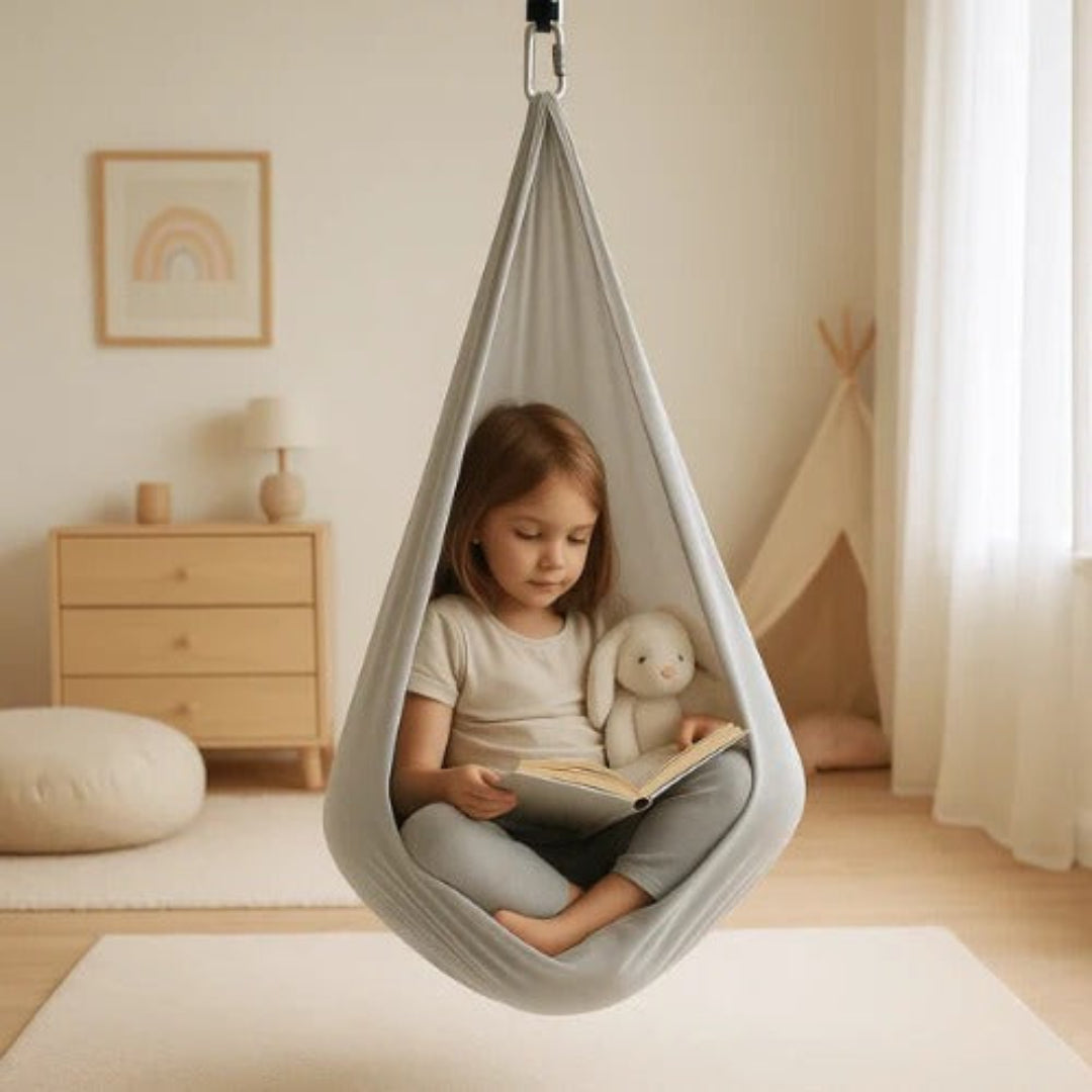 Balançoire sensorielle intérieure/extérieure pour autisme, favorise relaxation et apaisement.
