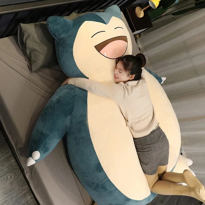 Grande peluche Ronflex Pokémon géante, douce et réconfortante. Idéale pour les câlins et le repos.