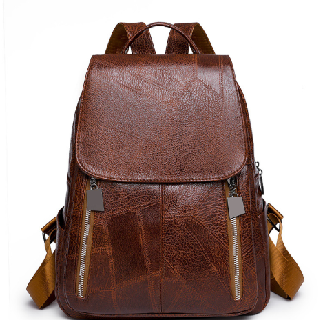 Sac à dos rouge femme élégant, avec système antivol, idéal pour ajouter une touche de couleur mode. Pratique et sûr.