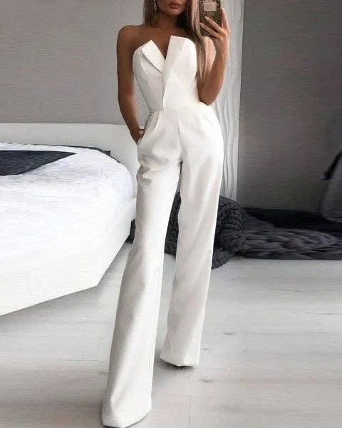 Jumpsuit femme moderne sans manches, disponible en rouge, noir, blanc. Coupe fluide, confortable pour l'été chic.