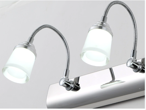 Applique murale LED Arcus, forme courbée contemporaine, optimise l'éclairage et la décoration du salon.