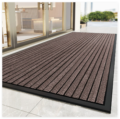 Paillasson polyvalent intérieur/extérieur, ultra-absorbant pour boue et poussière, avec base antidérapante robuste.