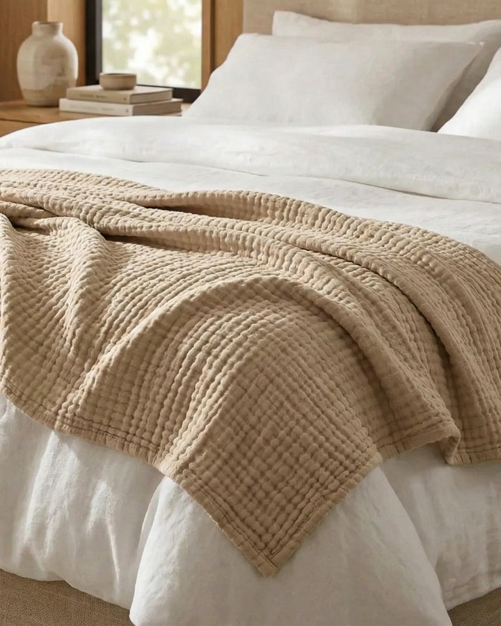 Plaid léger en mousseline respirante, parfait pour la décoration et le confort de votre maison.