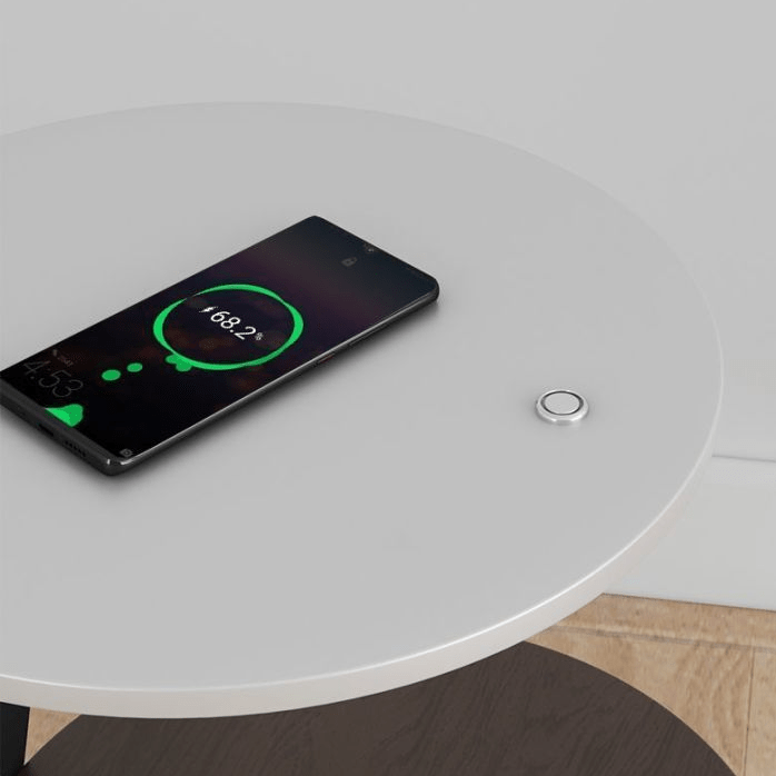 Table d'appoint ronde design, cadre acier noir, plateau bois. Idéale pour coin lecture moderne.