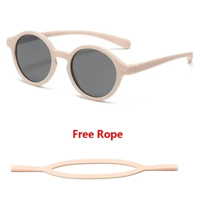 Accessoire essentiel bébé: lunettes de soleil flexibles, UV400, bandeau ajustable, grand confort.