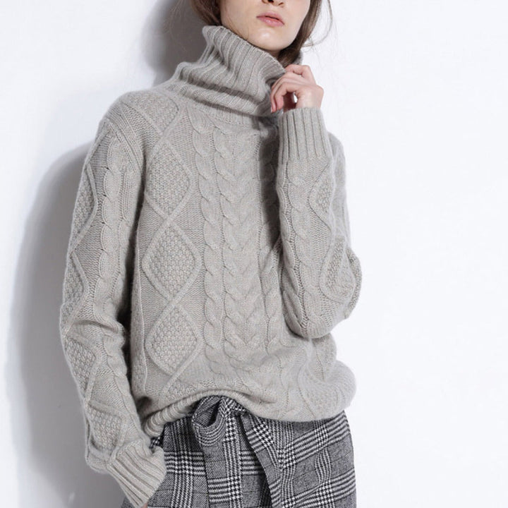 Pull femme confortable à col roulé, tricot élégant pour l'hiver. Idéal mode décontractée.