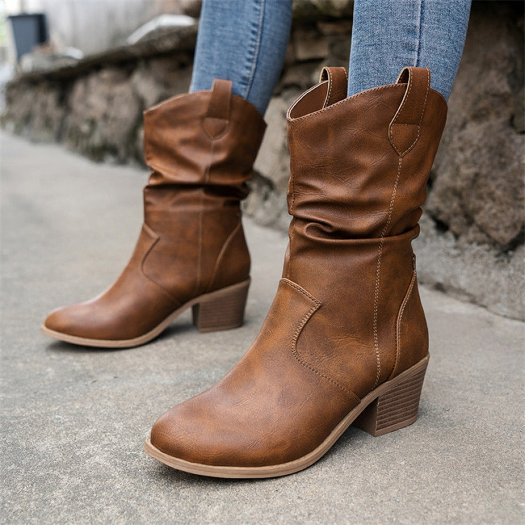 Bottes femme western mi-mollet confortables, un essentiel mode pour la saison froide et tendance.