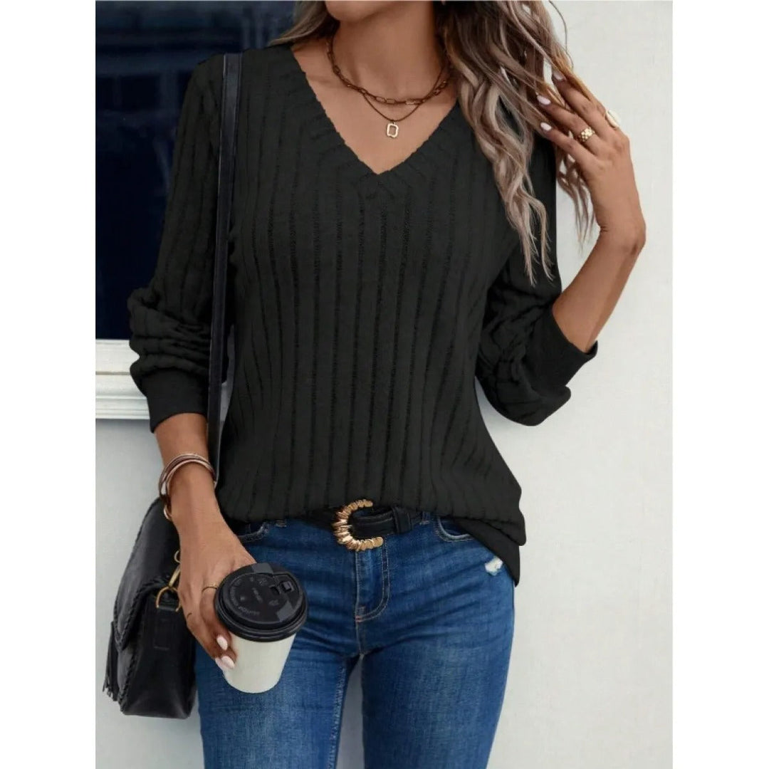 Top femme élégant col V, manches longues brossées, confortable pour un look mode décontracté.
