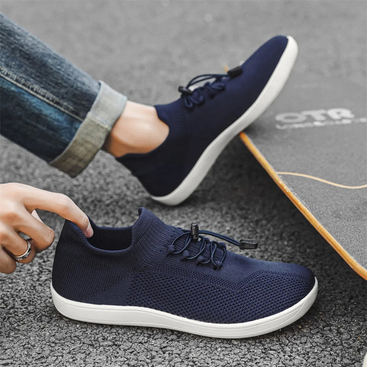 Sneakers sport unisexes respirantes, légères, offrant un confort optimal pour la marche, la randonnée ou la ville.