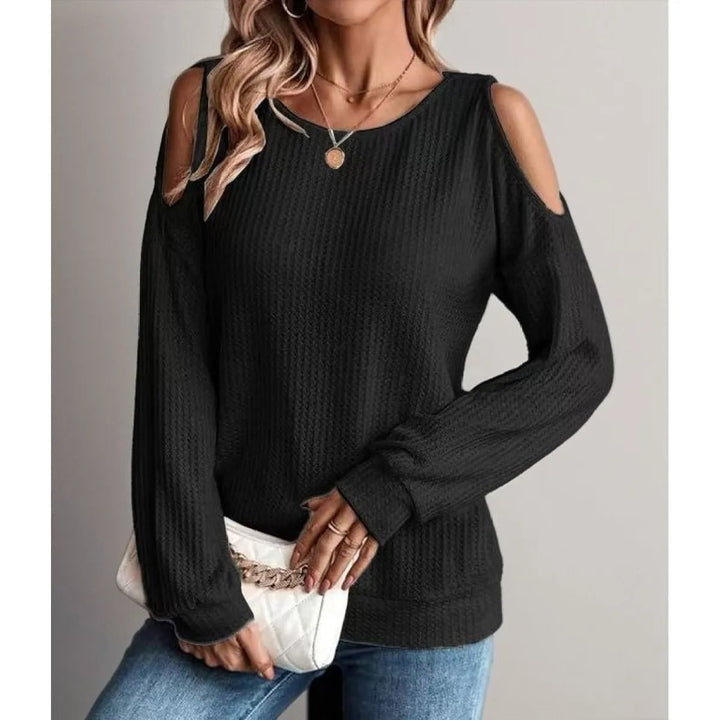 Top femme élégant à épaules dénudées, manches longues texturées. Style moderne et chic pour printemps/automne.