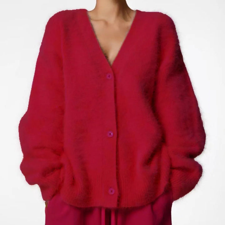 Gilet femme boutonné, coupe droite et décontractée, un essentiel élégant pour votre garde-robe mi-saison.
