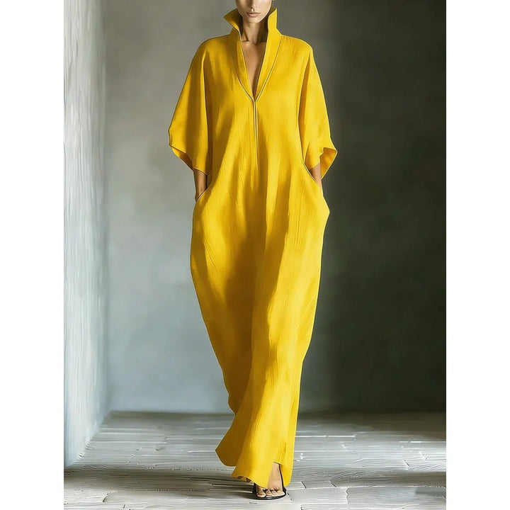Robe femme longue et fluide, col V élégant, style décontracté pour un confort optimal en été ou printemps.