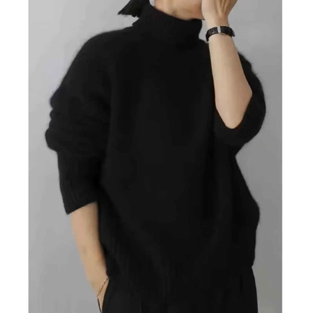 Ce pull d'hiver femme à col roulé, en maille épaisse et douce, combine parfaitement chaleur et élégance.
