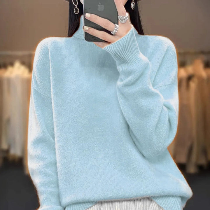 Pull femme col roulé casual chic, en maille épaisse pour l'automne et l'hiver. Un essentiel confortable.