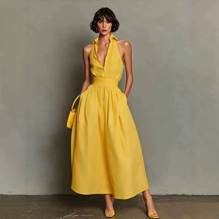 Robe longue femme élégante à col chemise, silhouette fluide plissée. Idéale pour le printemps/été.