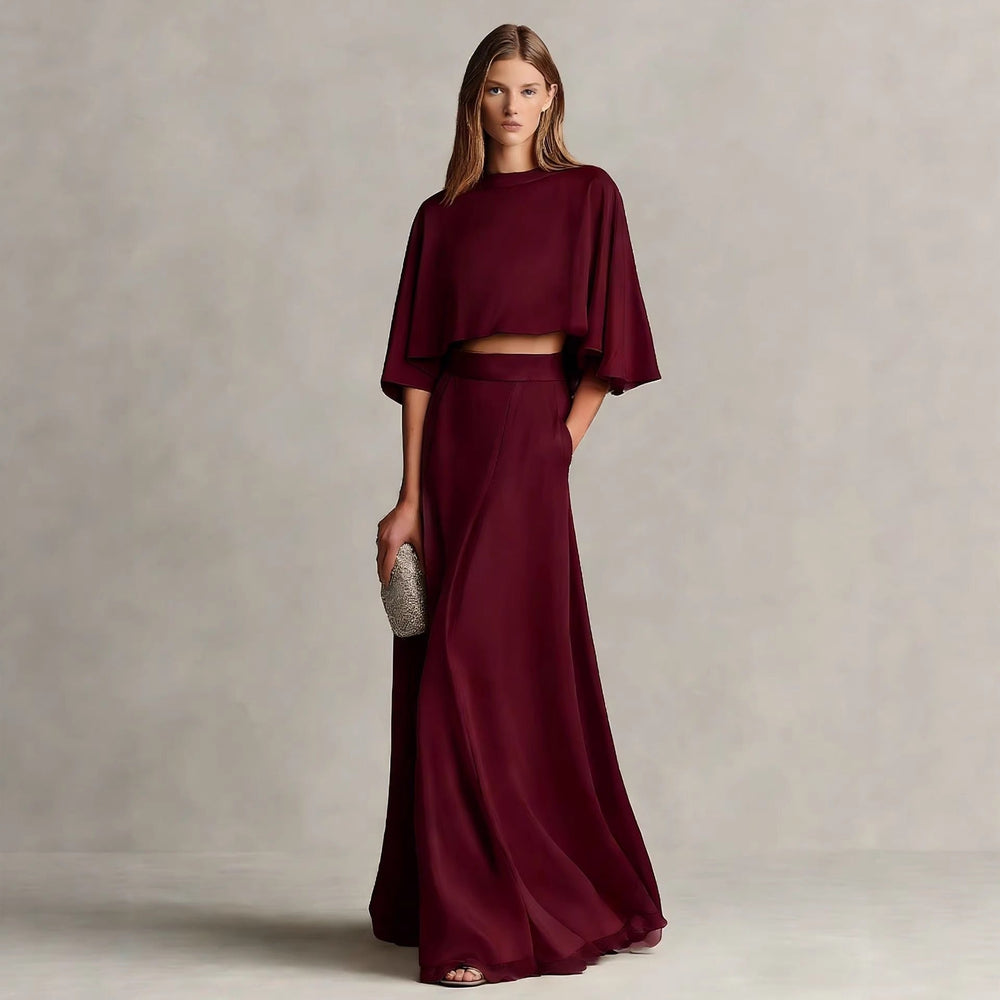Ensemble femme deux pièces en satin doux, chic et décontracté. Haut et jupe longue, idéal pour mode femme polyvalente.
