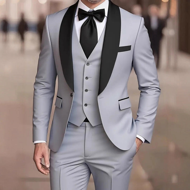 Détail du tissu et de la coupe décontractée du costume homme 3 pièces chic. Look polyvalent et raffiné.