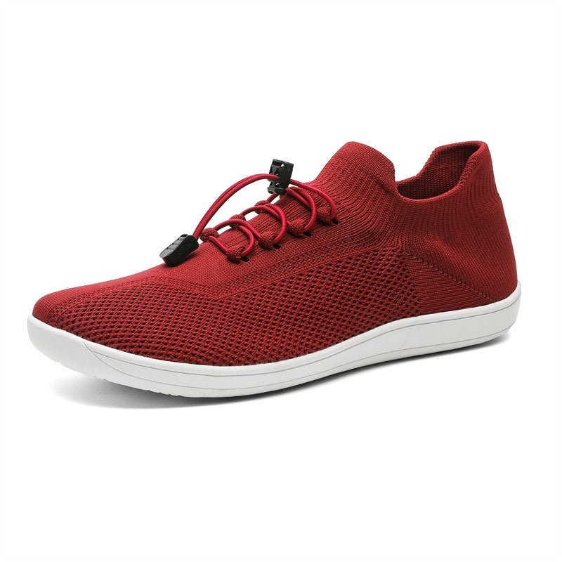 Sneakers unisexe toutes saisons, légères et respirantes, idéales pour la marche, le sport ou un style casual confortable.