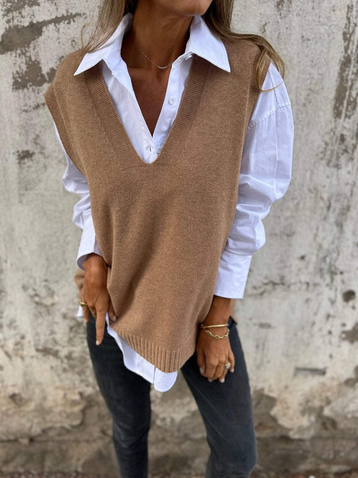 Gilet femme oversize chic porté pour une superposition élégante. Décolleté V profond, confort mode féminine toute saison.