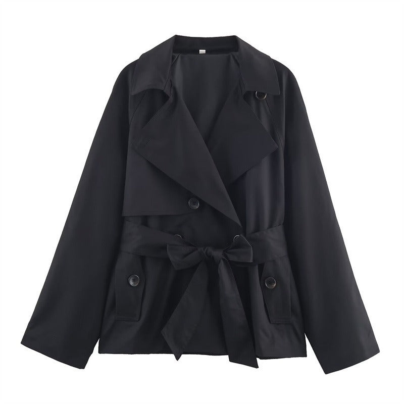 Trench femme élégant coupe loose, style moderne intemporel. Idéal pour l'automne-hiver, chic et décontracté.