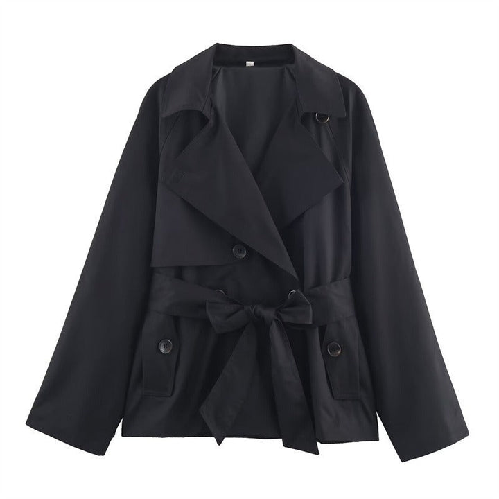 Trench femme élégant coupe loose, style moderne intemporel. Idéal pour l'automne-hiver, chic et décontracté.