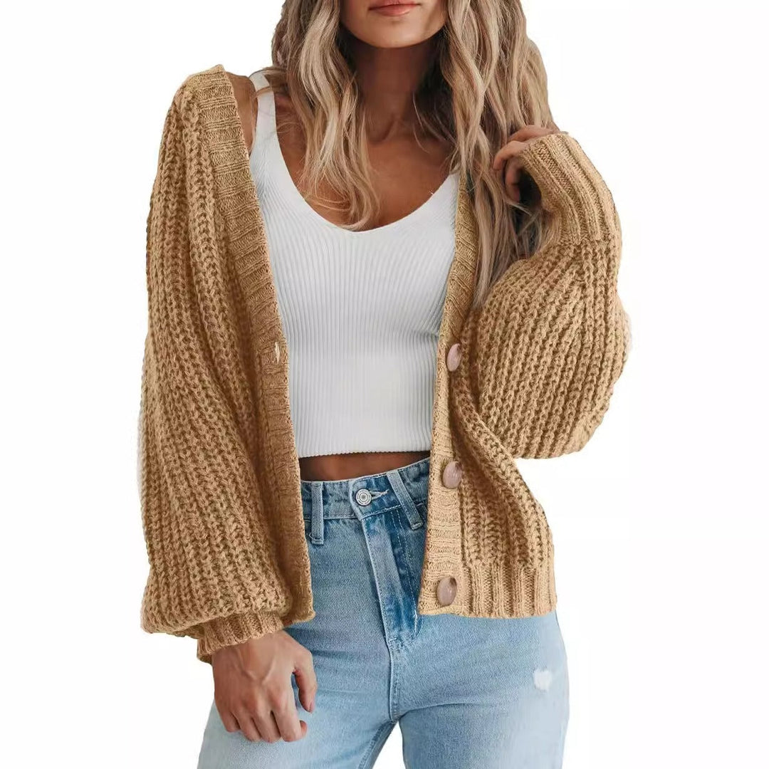 Cardigan femme confortable et chic, modèle oversize avec manches ballon élégantes. Parfait pour le quotidien.